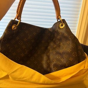 Gently used. Large. Few outfit changes.